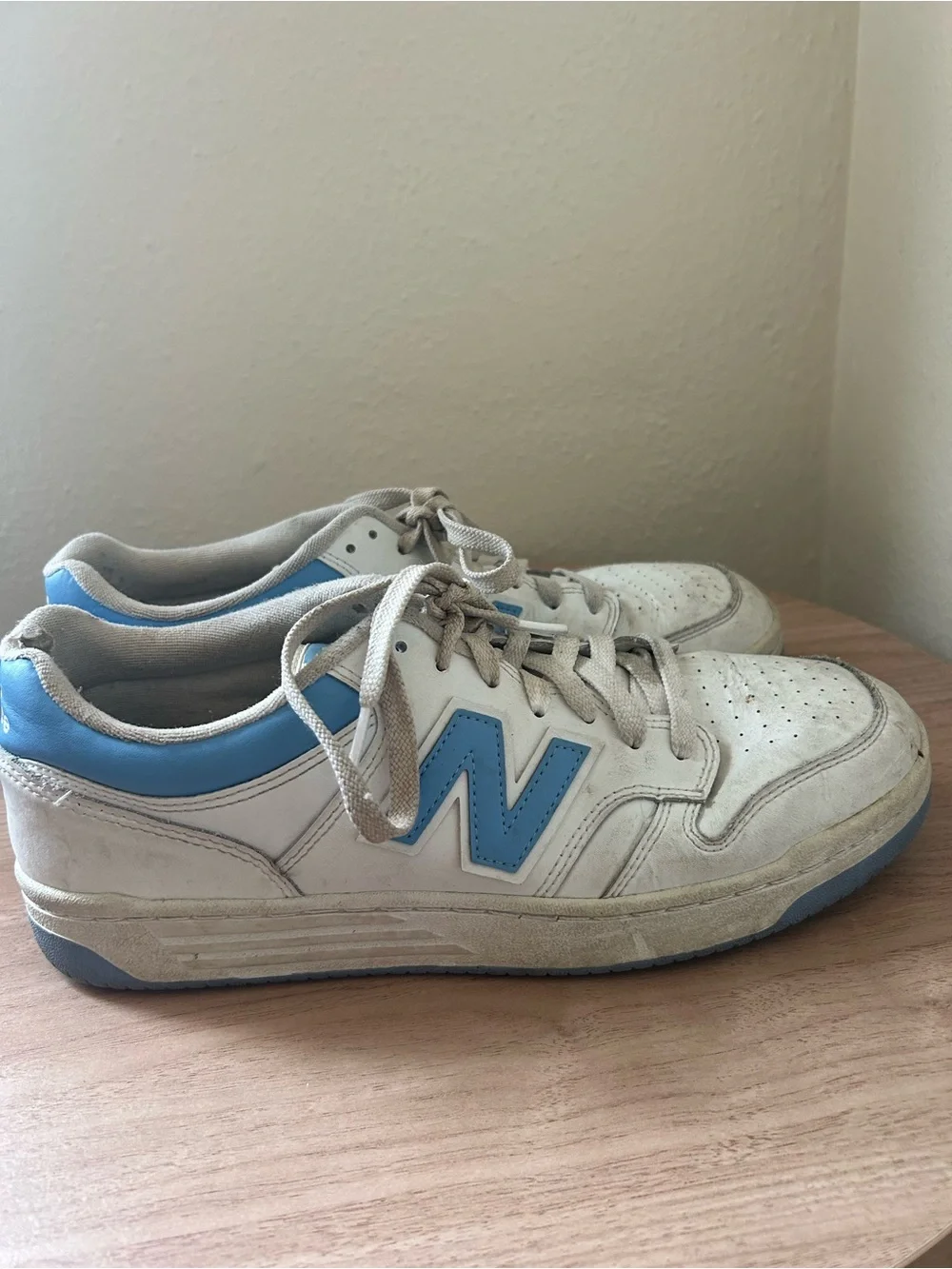 New Balance White Leather Sneakers with Light Blue Logo